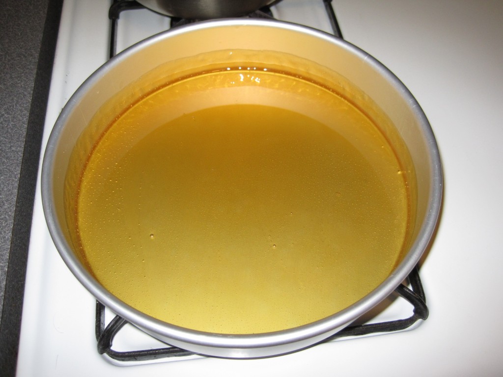 The caramel covering the inside of the pan.